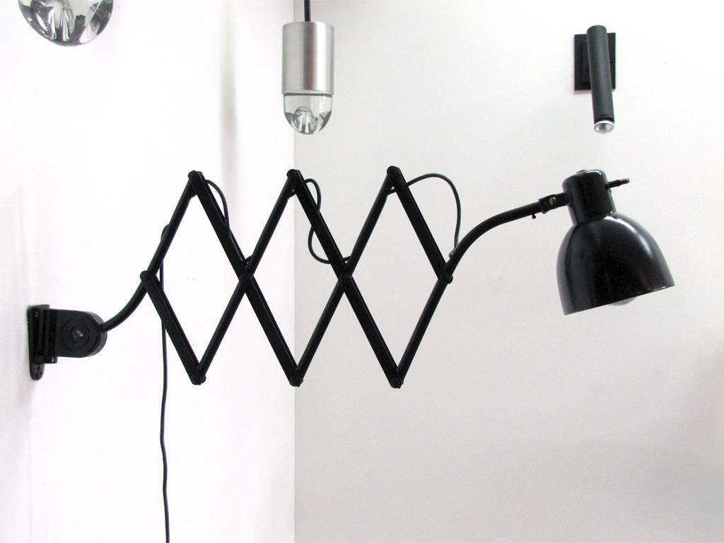 articulating black enameled metal scissor wall lamp by Hala, extends from 19