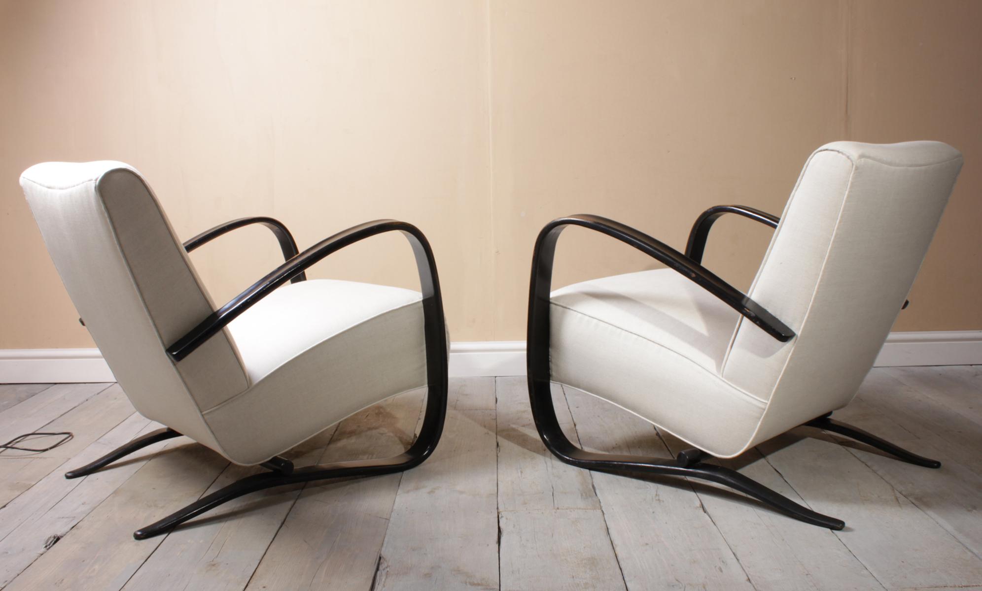 Halabala armchairs H269
A pair of model H269 armchairs designed in 1935 by jindrich Halabala and produced in chzecoslovakia by up to the end of the 1950s this pair are early 1940s with original ebonized arms and have been fully re