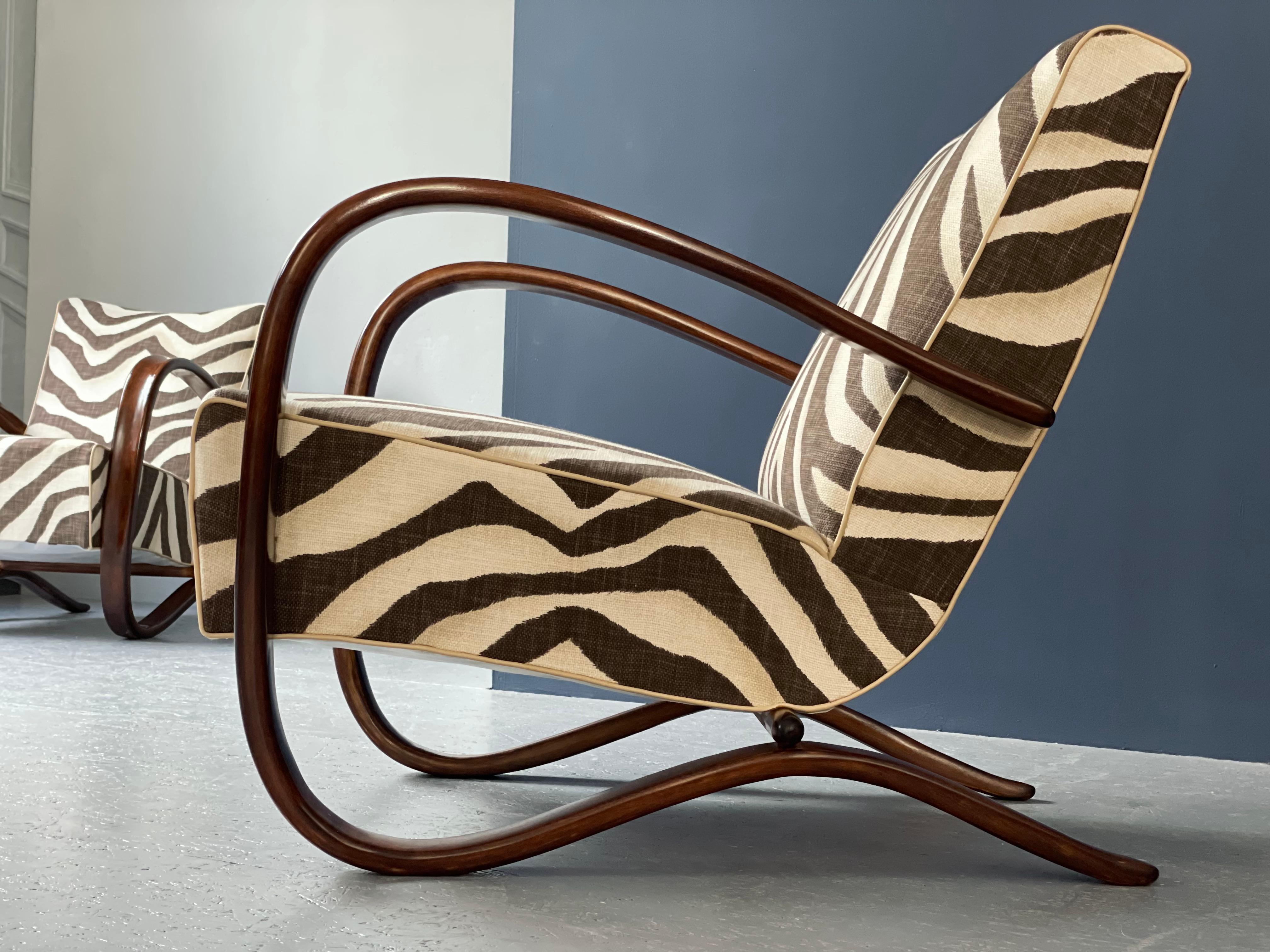 Created in Czechoslovakia by Jindrich Halabala in the 1930's this chair is one of the most recognizable pieces of it time. Newly upholstered with Ralph Lauren Zebra fabric this mid-century piece with its freshly lacquered Bent Beachwood frame is an