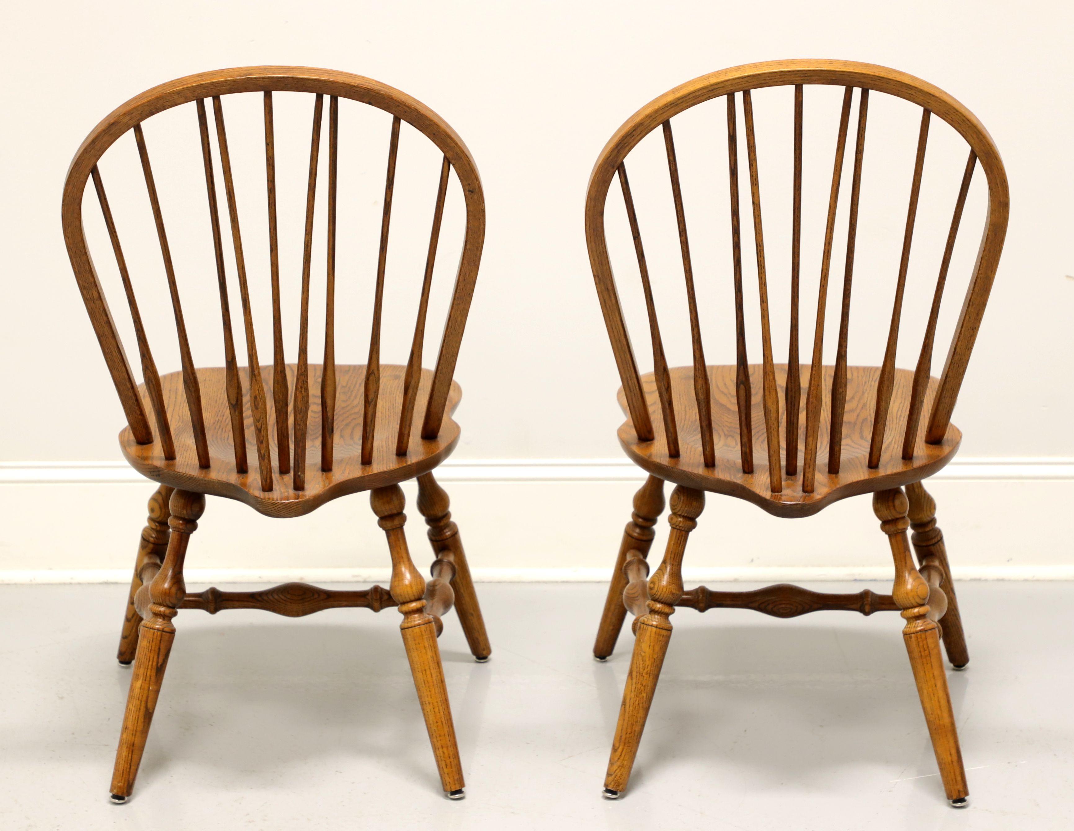 HALE Mid 20th Century Solid Oak Windsor Dining Side Chairs - Pair A In Good Condition In Charlotte, NC