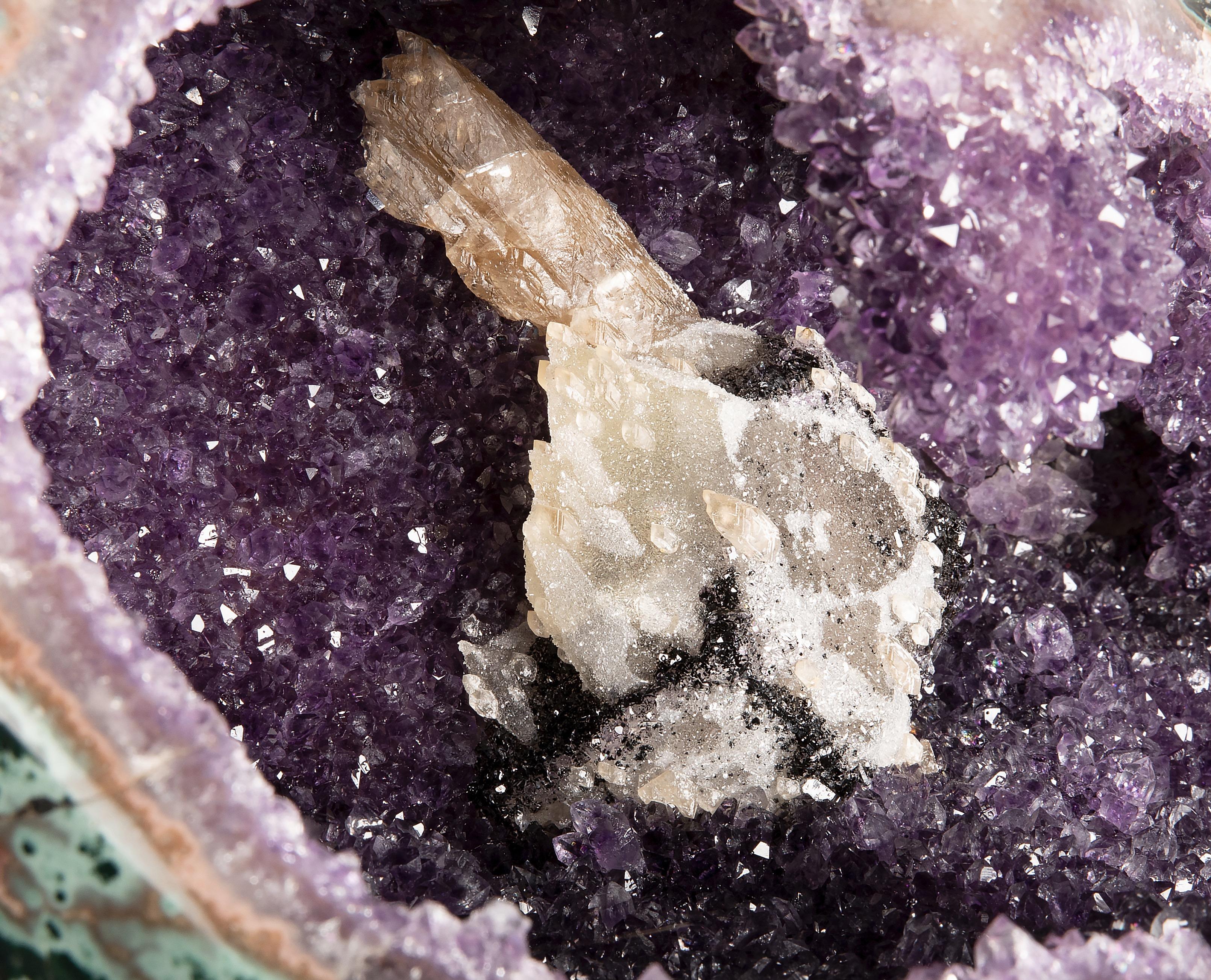 Half Amethyst Geode with Calcite Formation Overlaid by Hematite and White Quartz 1