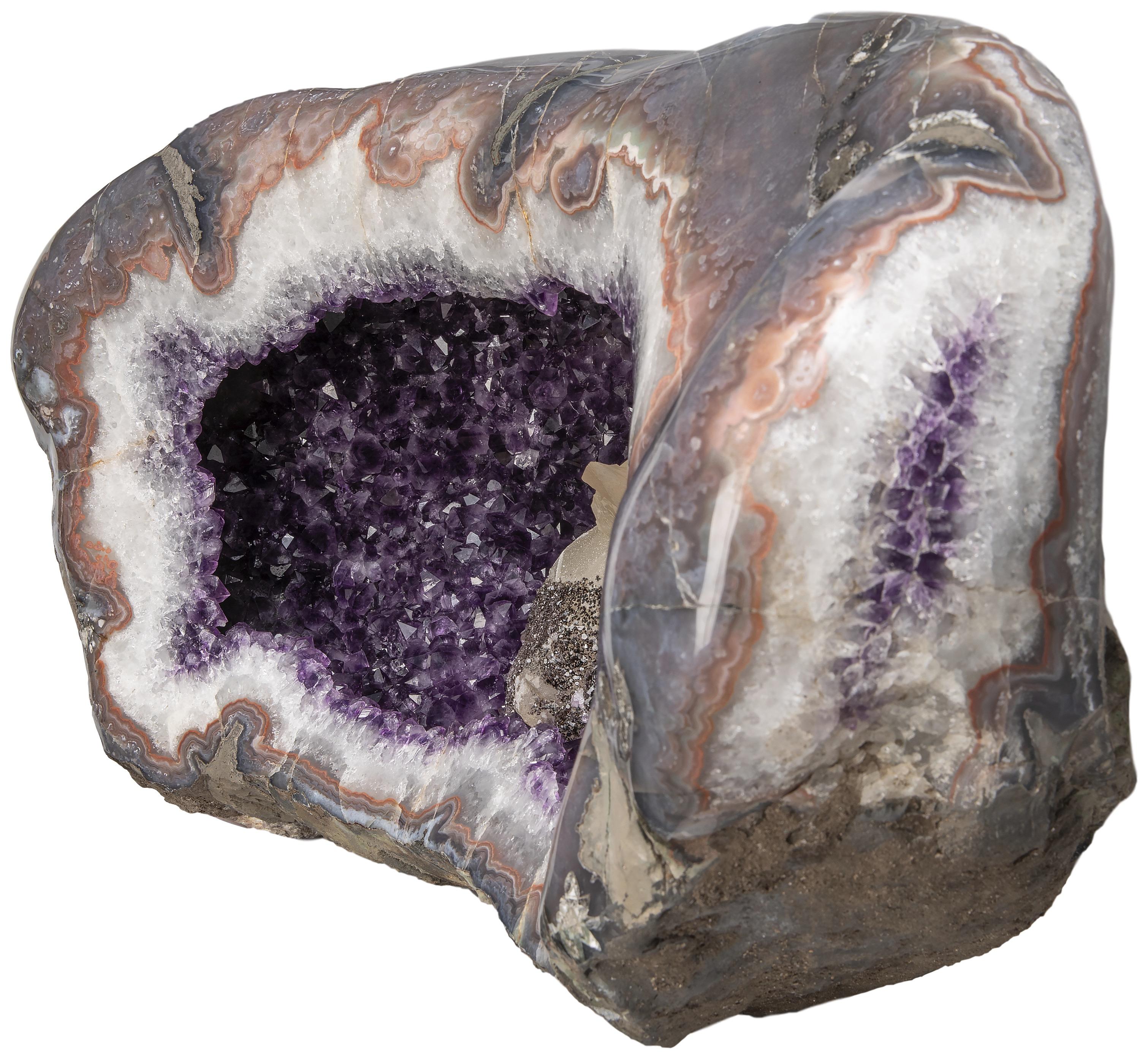 Agate Geode améthyste avec une formation inhabituelle de Calcite à l'intérieur et hématite