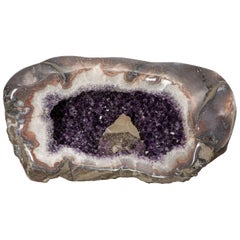 Half Amethyst Geode with Unusual Calcite Formation Inside and Hematite