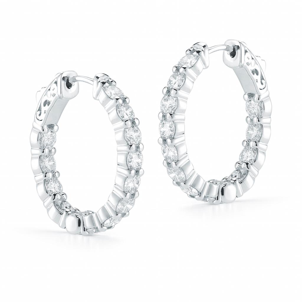 High quality inside-out diamond hoop earrings. Diamond hoop earrings a staple in every jewelry collection. Versatile enough to be worn from dusk to dawn, with jeans or heels making them the perfect gift for any occasion. 
Material: 18K White