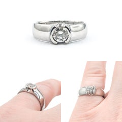 Half Bezel Diamond Engagement Ring In Platinum