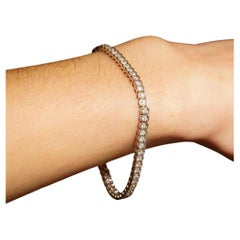 Bracelet tennis en or blanc 14 carats avec demi-cerceau et diamants