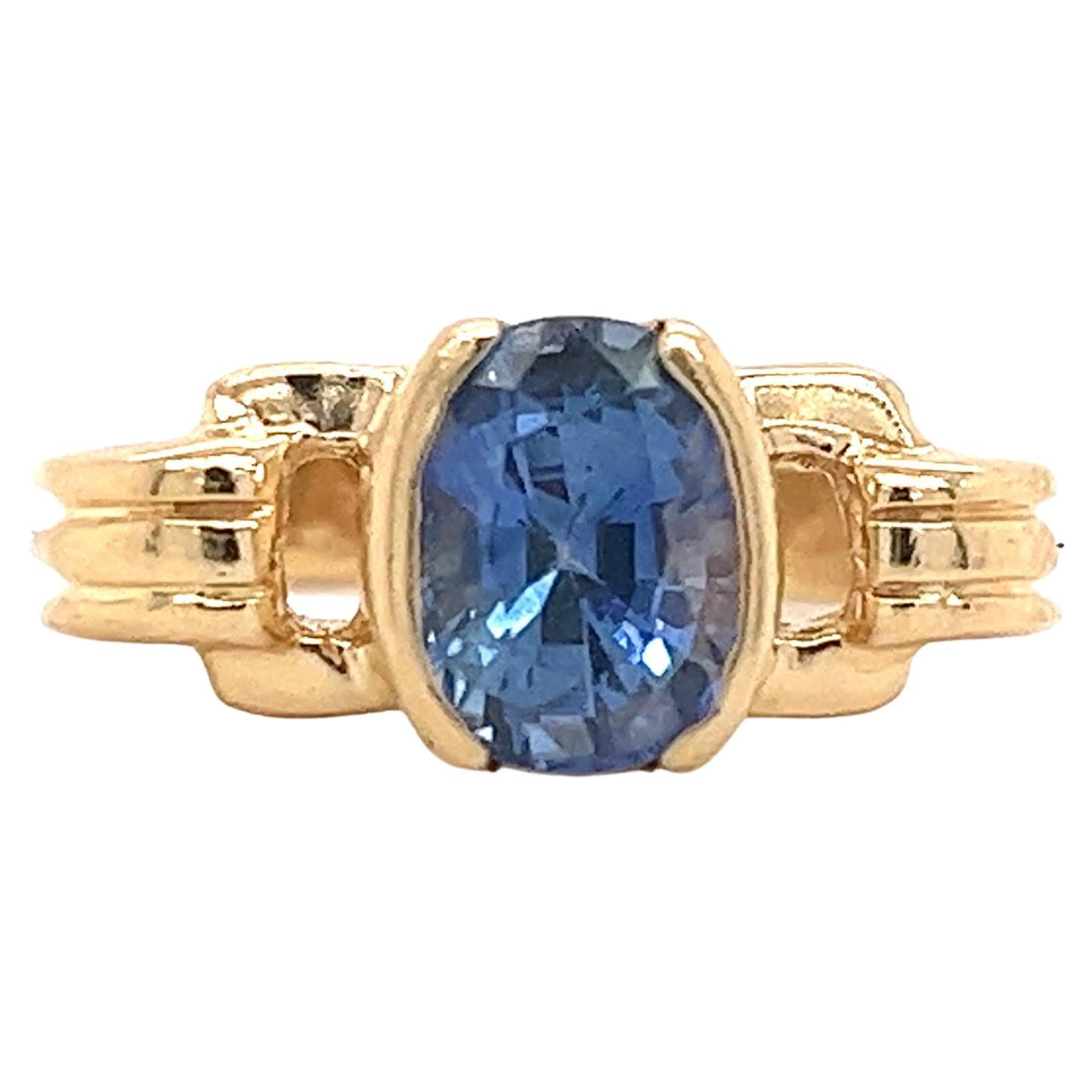 Half Bezel Set 2 Carat Oval Blue Sapphire Vintage Ring in 14k Gold For Sale
