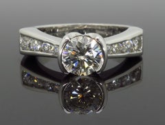 Half-Bezel Set Round Diamond Engagement Ring