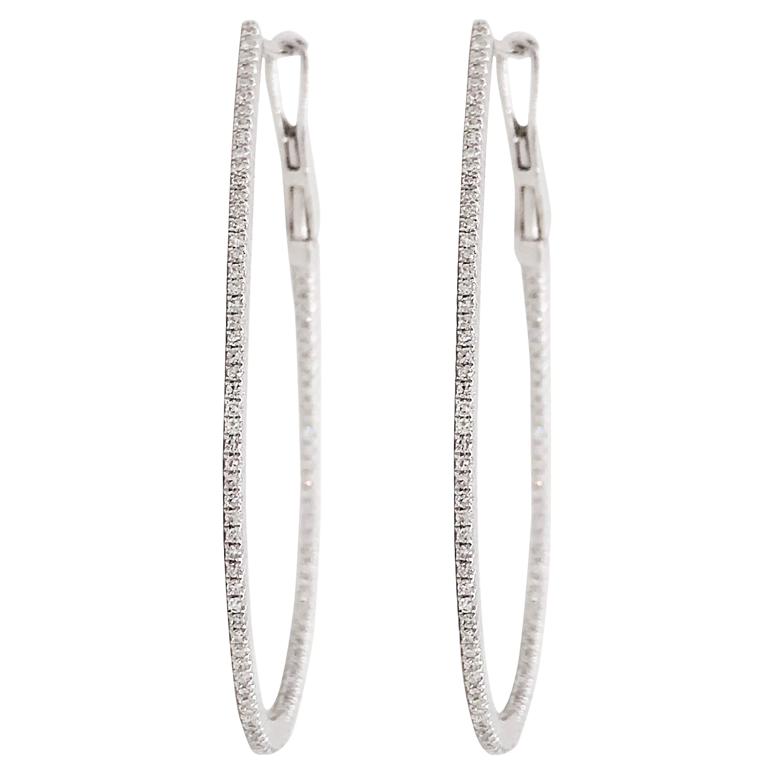 Pendientes de aro ovalados de medio quilate de diamante Inside Out Oro blanco de 14 quilates