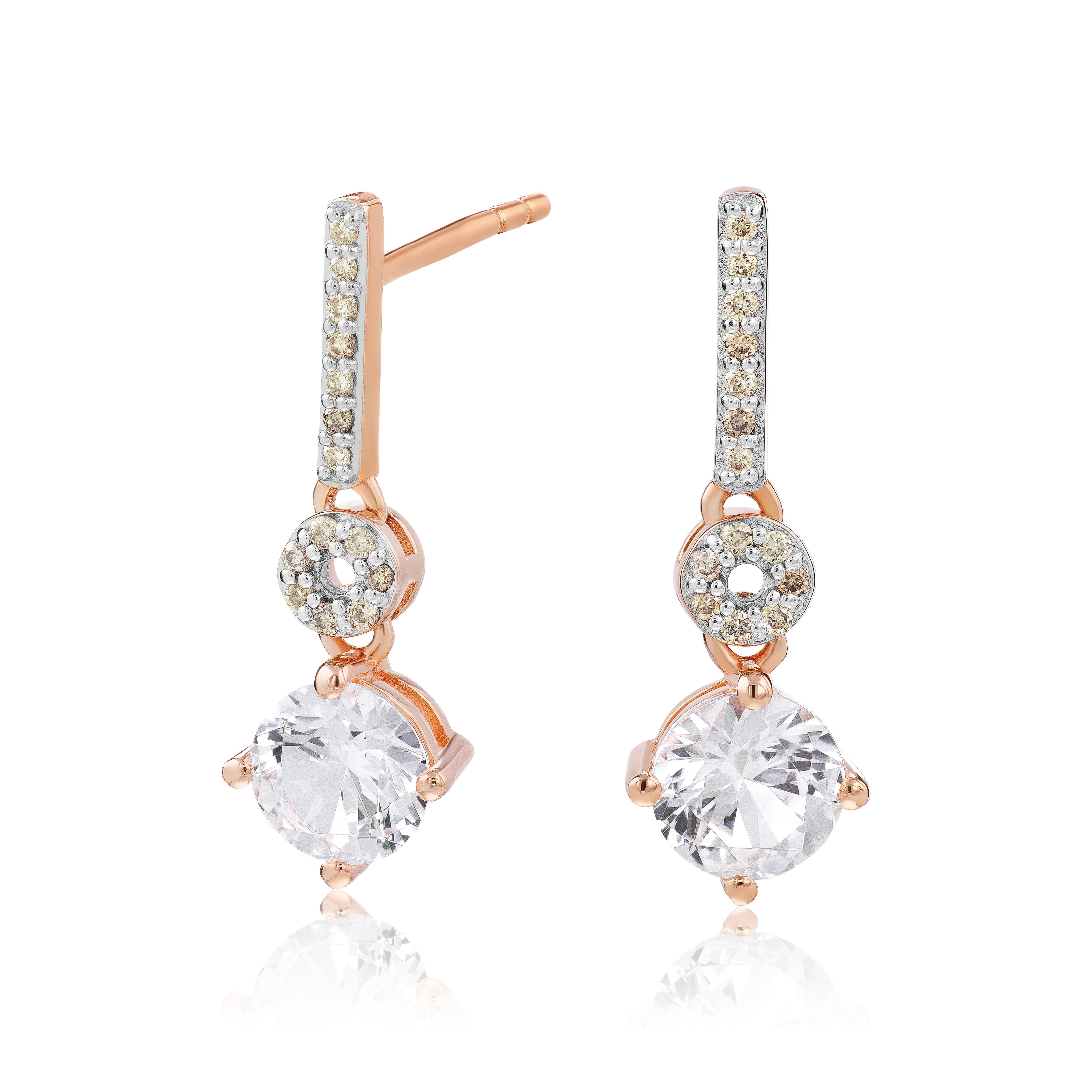 Enhance your style with the sophisticated elegance of these sterling silver earrings. The 28 natural brown diamonds, totaling .10 carats, create a mesmerizing and unique look that will surely captivate attention. The warm and earthy tones of the