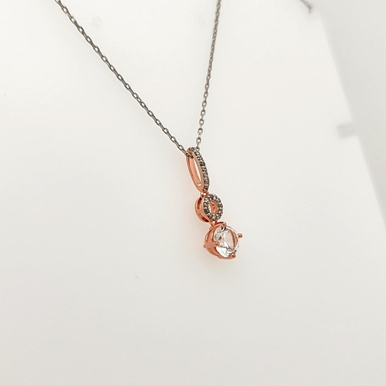 Half Carat Sized White Sapphire and Brown Diamond Drop Halo Pendant For