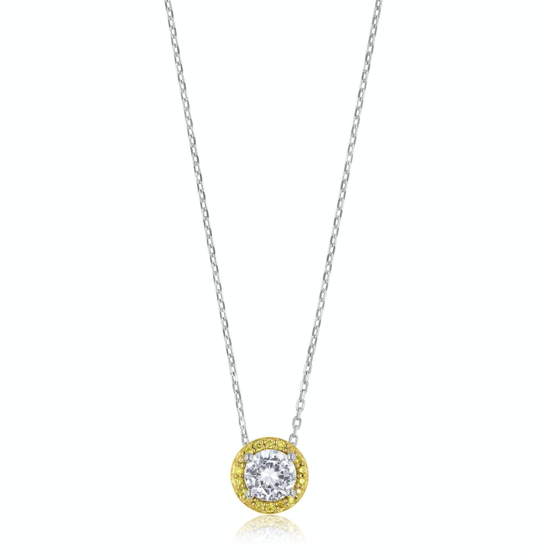 Enhance your style with our exquisite 38M01437-YL Sterling Silver Pendant. This pendant features a stunning 5mm simulated white sapphire round at the center, weighing approximately 0.56 carats. The brilliance and clarity of the white sapphire create