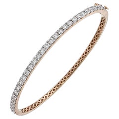 Pulsera brazalete de medio diamante en oro rosa de 18 quilates