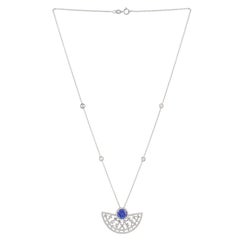 Chaîne collier pendentif demi-disque en or blanc 18 carats avec diamants et tanzanites