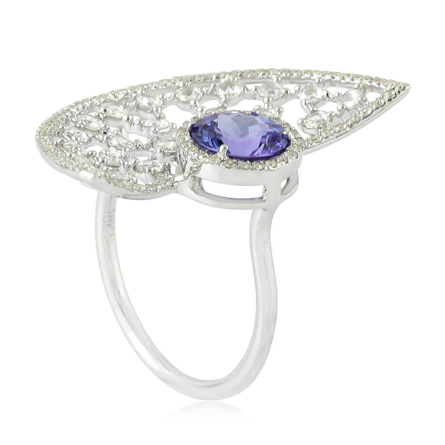 Halbscheibenring aus 18 Karat Weißgold mit Tansanit und Diamanten (Gemischter Schliff) im Angebot