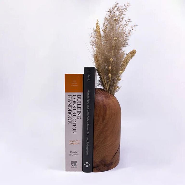 Secure and display your favorite books with this beautiful Oak Wood Book End! Hand-crafted from natural oak wood, this book end is both durable and attractive, adding a timeless elegance to your home library. The sturdy construction supports your