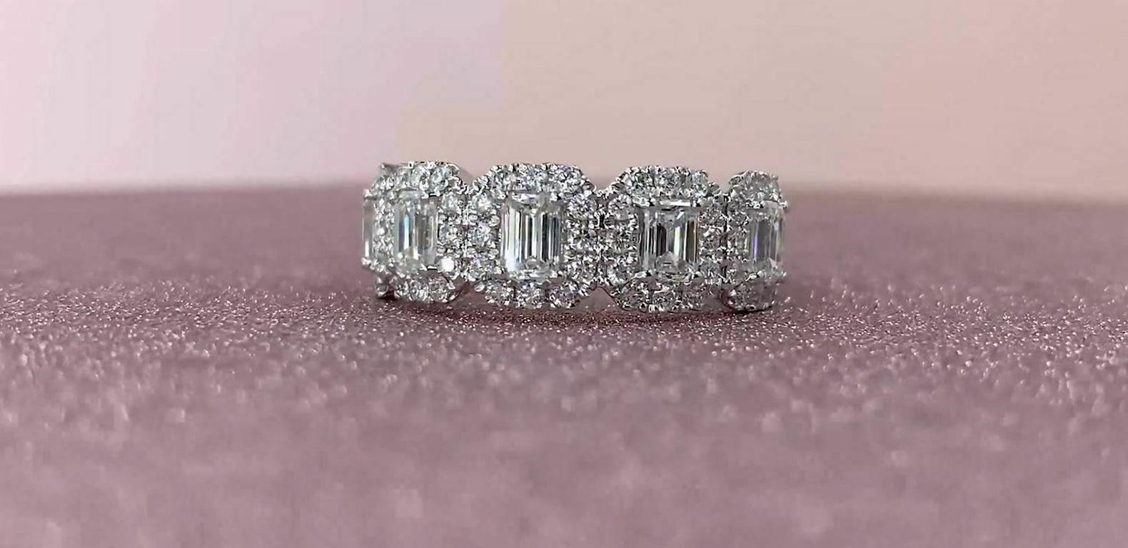 Emerald cut diamonds (1.06 total carat weight) and round diamonds (0.60 total carat weight) half-eternity engagement ring in 14k white gold. The ring is designed and handmade locally in Los Angeles by Sage Designs L.A. using earth-mined and conflict
