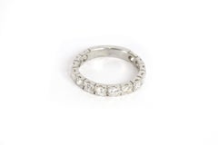 Half eternity ring band in platinum and diamonds