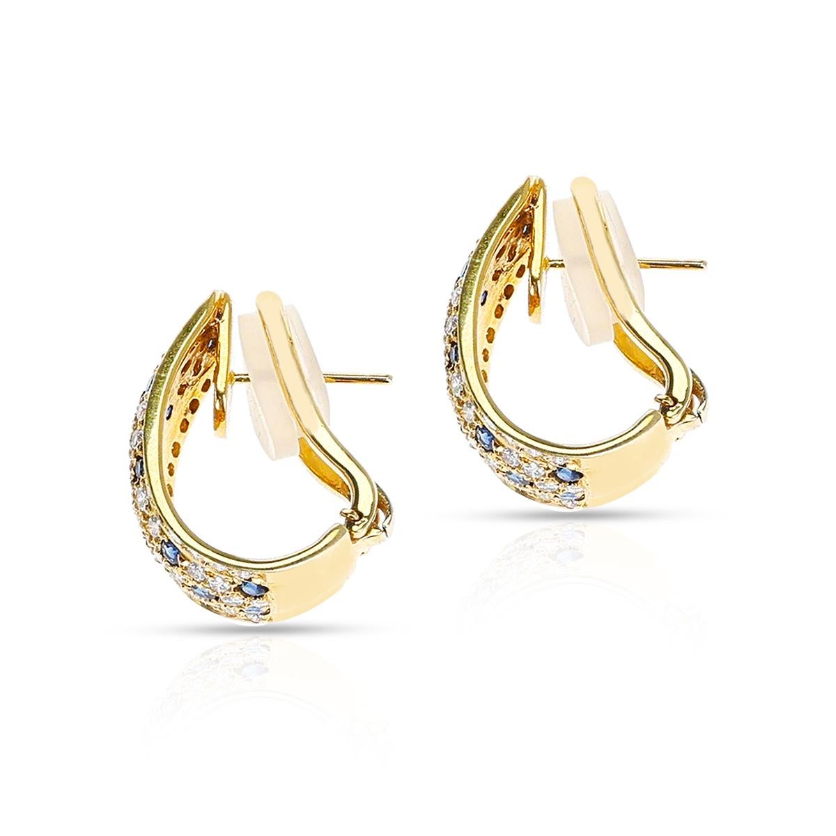 A pair of Half-Hoop Round Diamond and Round Sapphire Earrings with 18 Karat Yellow Gold. The diamond weight is appx. 1.60 carats and the weight of the sapphires is appx. 1.50 carats. The total weight of the earrings is 17.05 grams. The length of the