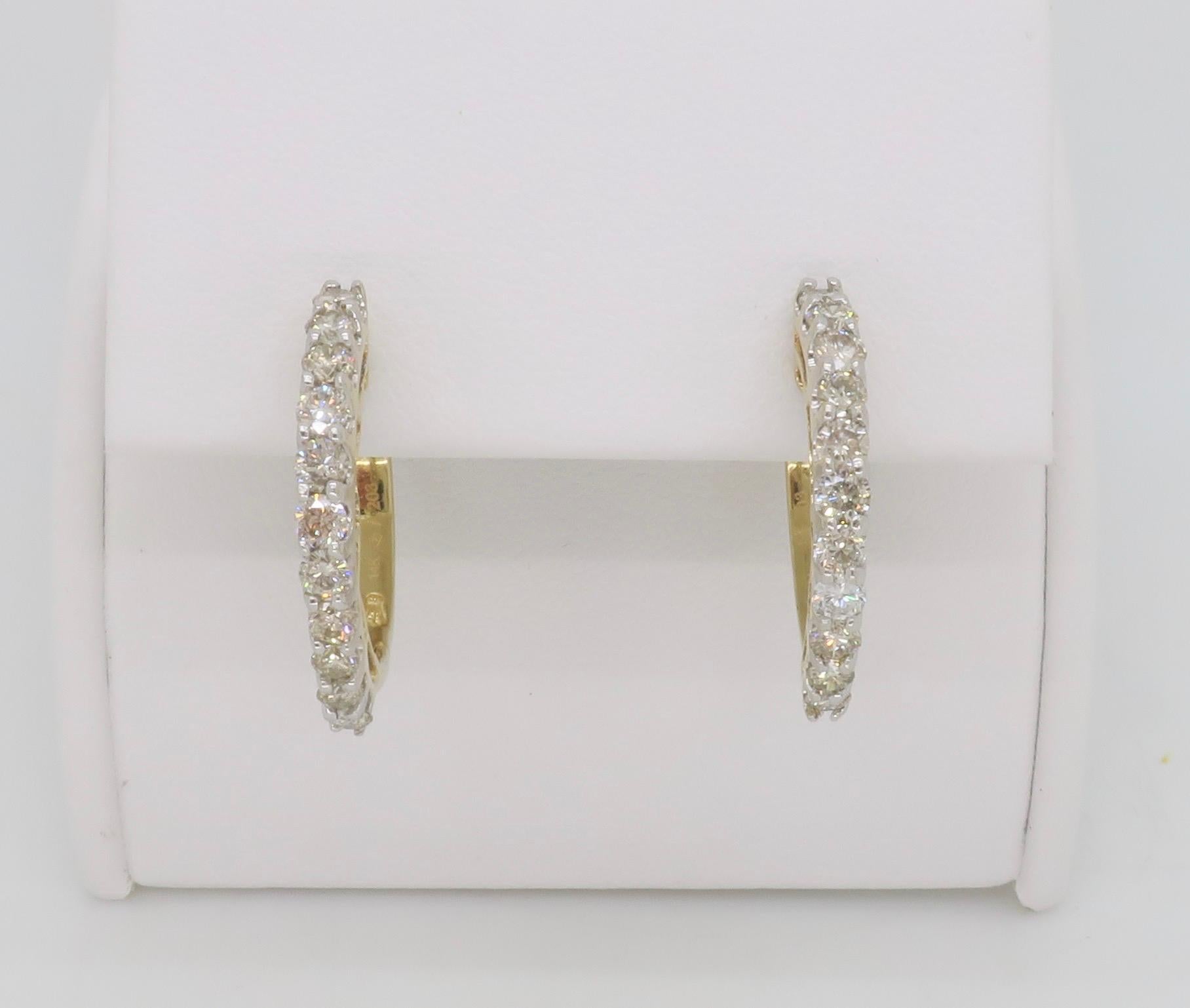 Stunning pair of half-hoop diamond earrings made in yellow gold. 

Diamond Carat Weight: 1.00CTW
Diamond Cut: Round Brilliant Cut Diamonds
Color: Average J-K
Clarity: Average VS-SI
Metal: 14K Yellow Gold
Marked/Tested: Stamped “14k