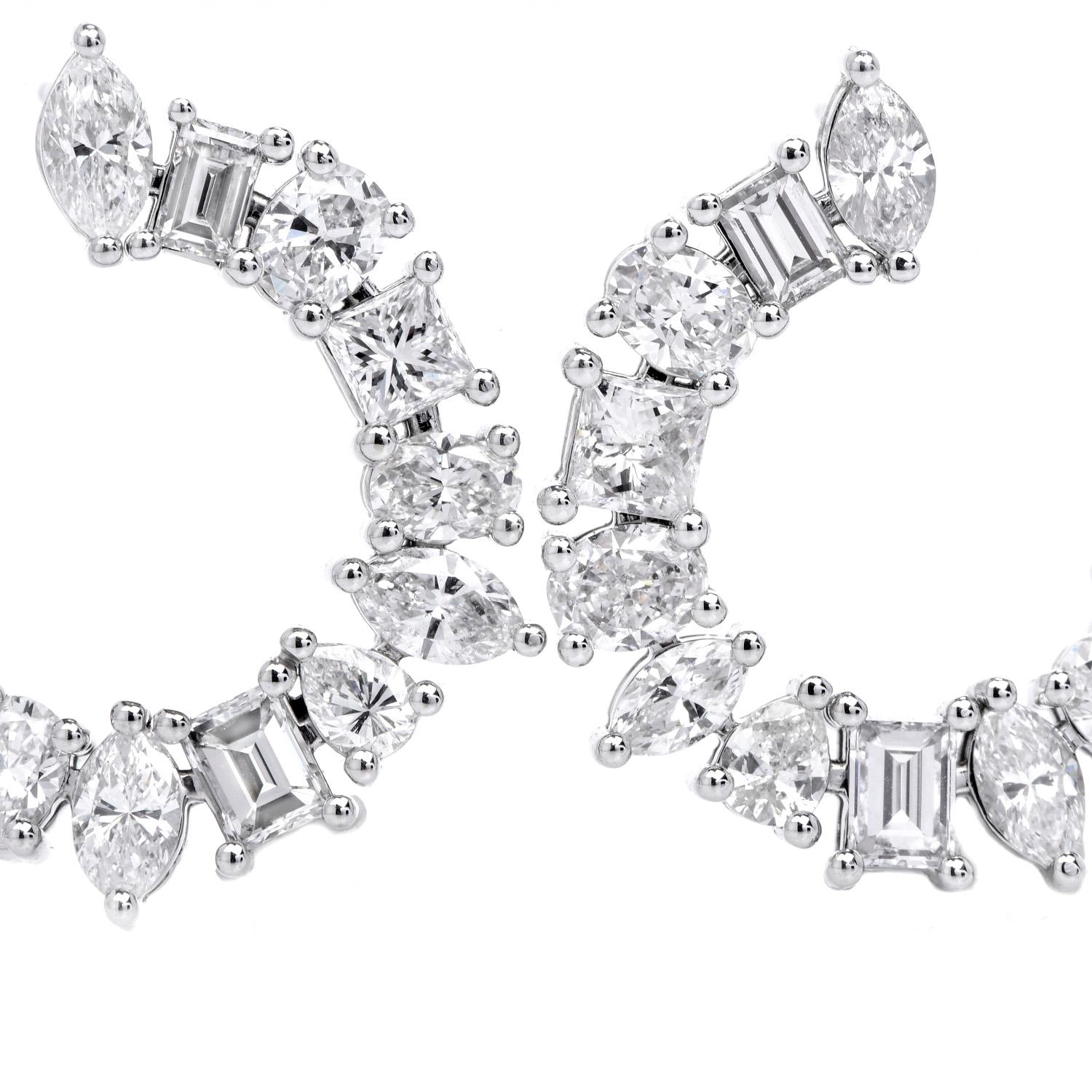 High-End Luxurious Hoop Earrings crafted in solid Platinum!

These pieces are a parade of (26) Genuine Natural Diamonds, Prong Set, cut in Oval, Pear, Round, Baguette, Princess and Marquise cut, weighing 4.46 carats in total (G-H color, VS