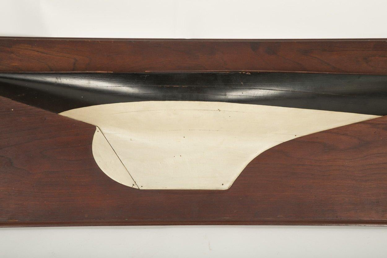 A half hull model of a racing yacht belonging to the Pope family, circa 1920-1930.