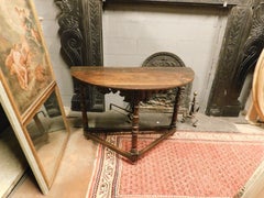 Half-moon console table, in carved chestnut wood, Italy
