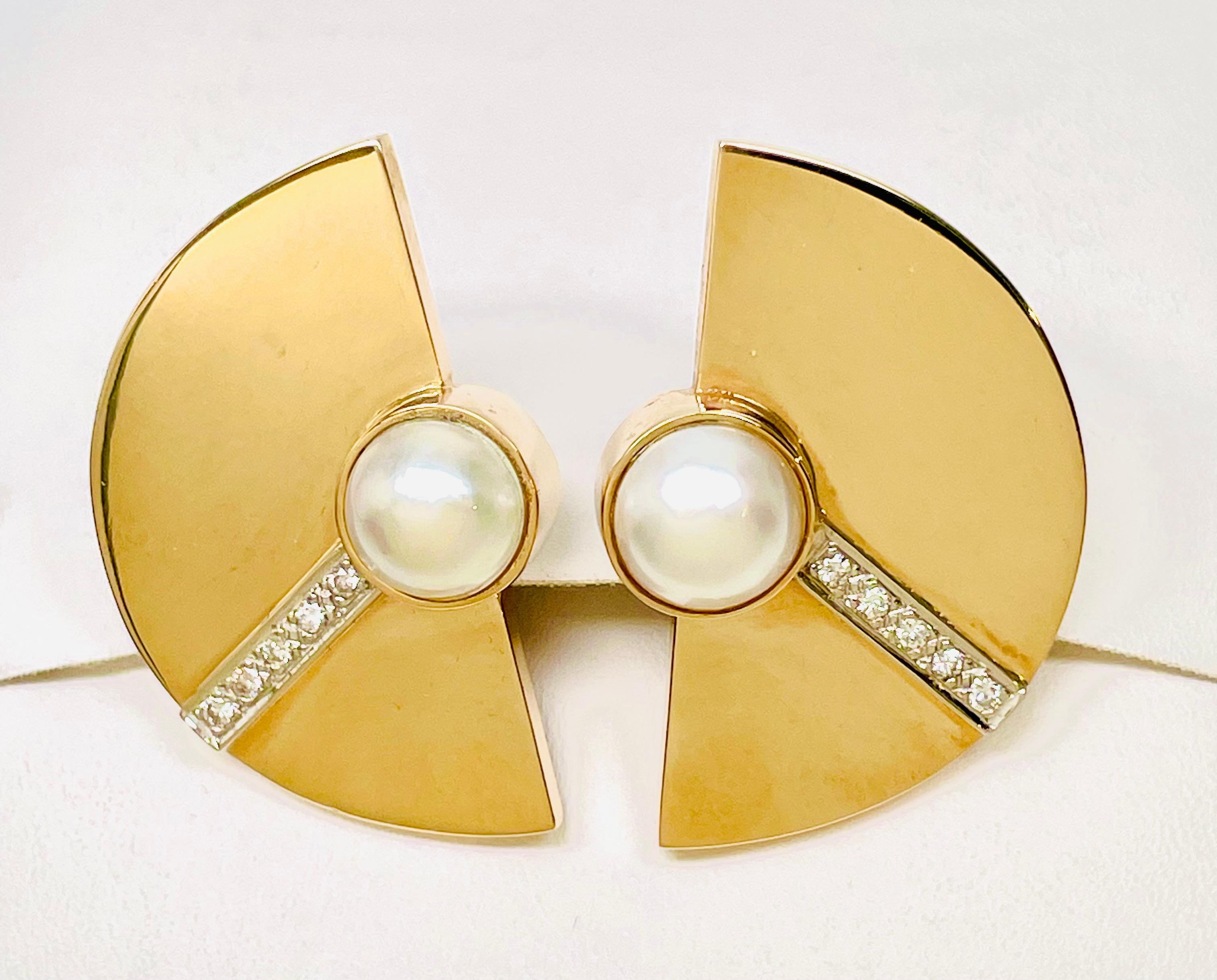These fabulous LARGE one-of-a-kind statement earrings are polished to a mirror finish. (Difficult to take photos because of the reflections!)  Custom made in 1991 by jewelry artist Marcy Feldman for Heartwear Designs. They are 14kt. Yellow Gold half