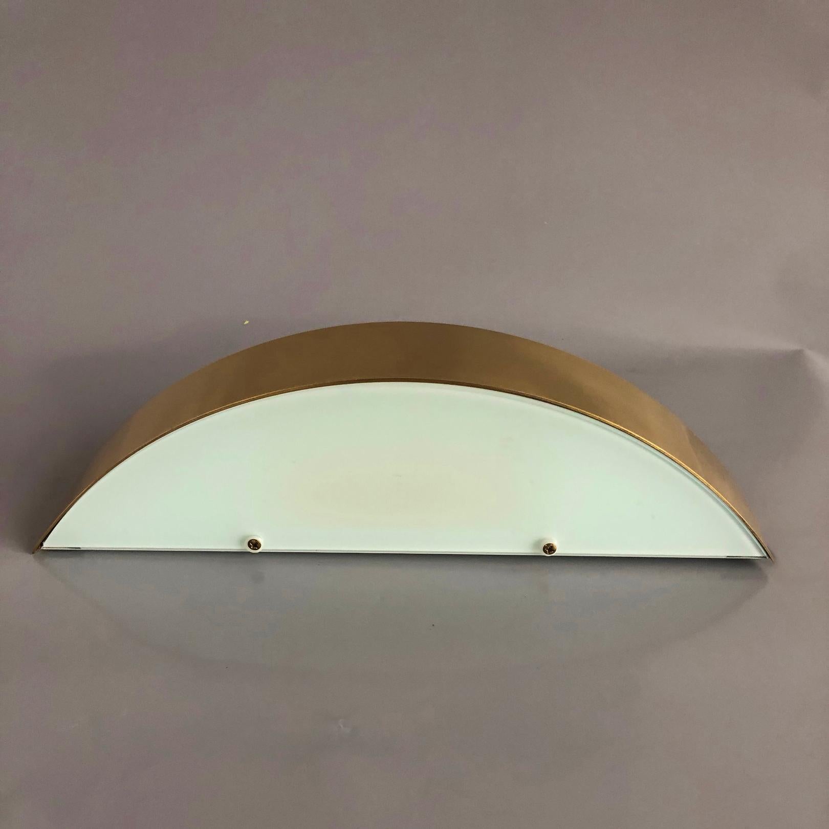 This Minimalist wall light in an was custom made in limited edition for a luxury hotel. This wall light model was not available on the market.