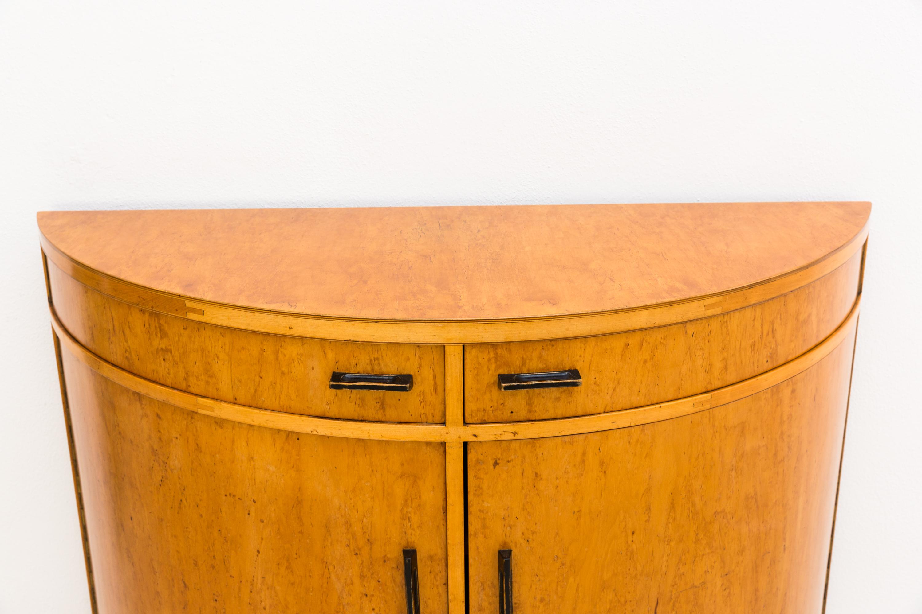 Incredibly beautiful half moon sideboard, designed by Alvar Aalto. From the private collection of Dr Kossdorf, labelled on the back, Finmar. Manufactured in 1935-1936, a rare and highly covetable historic piece, probably the only piece on the world