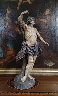 HALF OF THE 18th CENTURY PAINTED WOOD SCULPTURE OF SAINT SEBASTIAN
