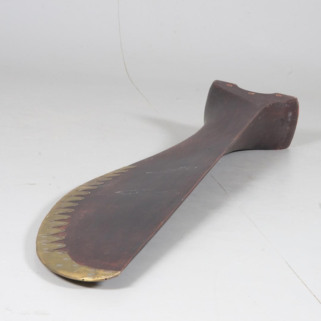 Propeller blade, wood with metal edge.