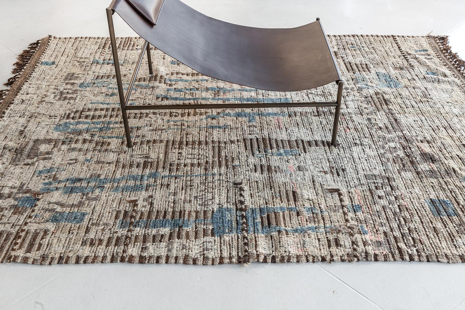 'Halfah' is a natural earth toned pile weave and modern day interpretation of the Moroccan world. The rugs irregular shapes and strokes resemble the fibers of nature and their ability to be used for crafts such as cords and basketry. Designed in Los