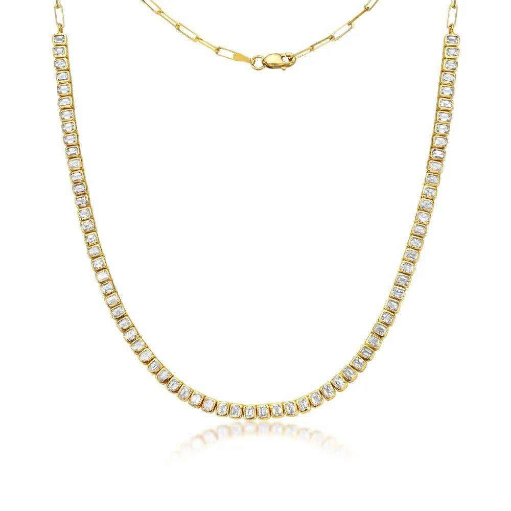 This striking necklace seamlessly blends classic elegance with contemporary flair. It features a stunning combination of a HalfWay Emerald Cut Diamond Tennis Necklace and a Half Paperclip Chain, crafted with impeccable attention to detail in