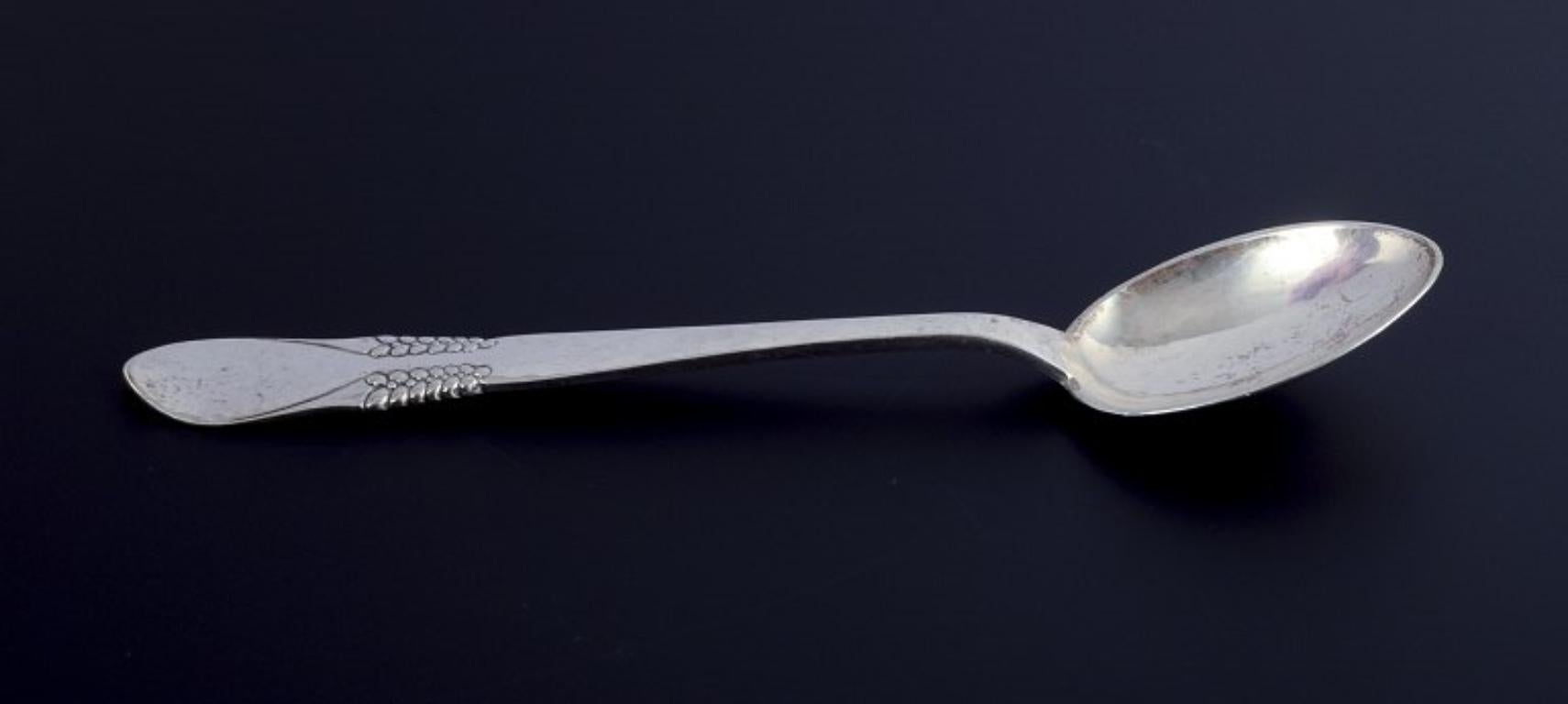 Pre-owned goods are exempt from import duties for U.S. customers. 
Therefore, no import tariffs will be applicable to your purchase.

Halgreen, Danish silversmith. Three coffee spoons in hallmarked silver.
Hand-hammered silver.
Hallmarked: CFH: