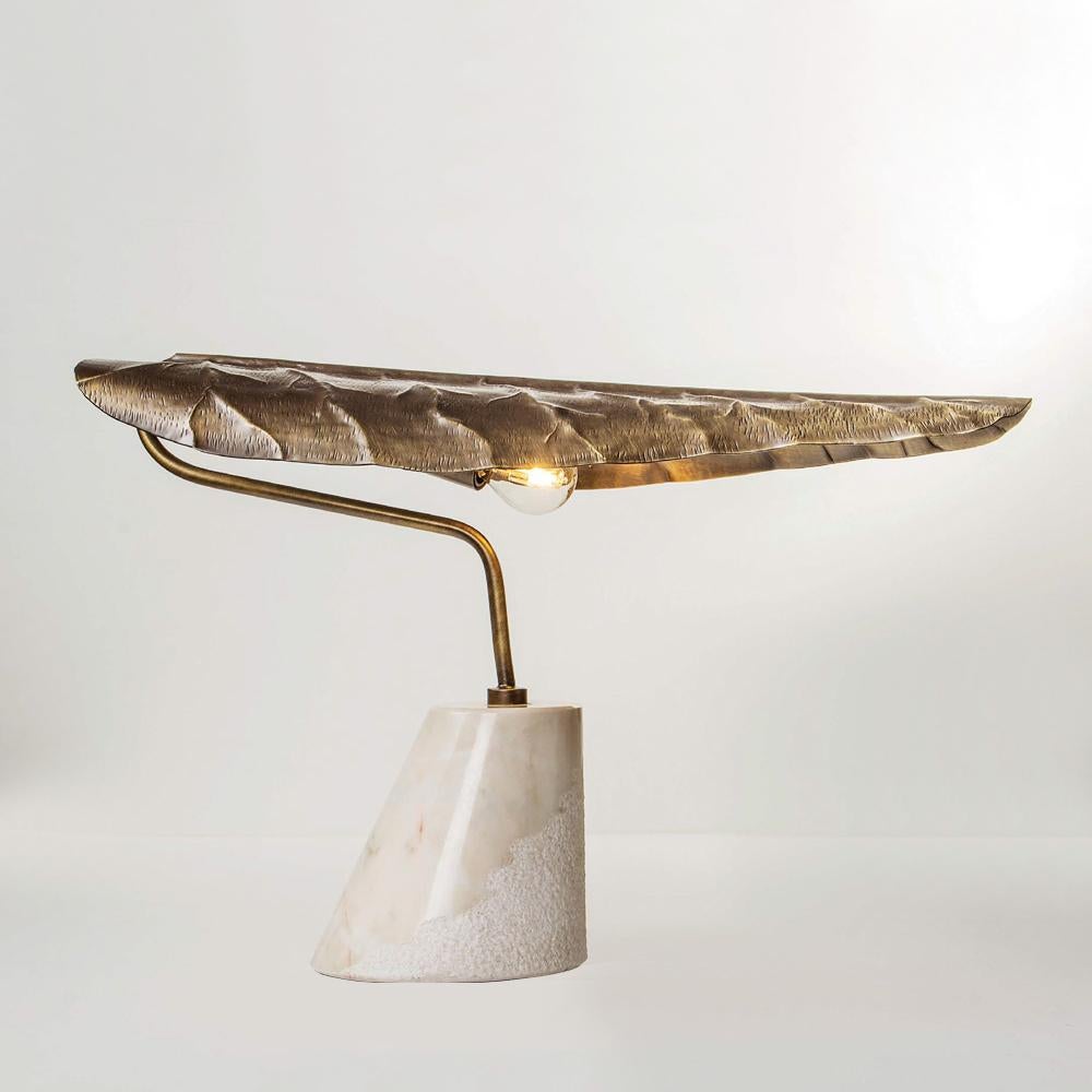 Table Lamp Halian with polished white marble base and
with hammered solid brass shade, in vintage patina finish.
1 Bulb, bulb not included.
