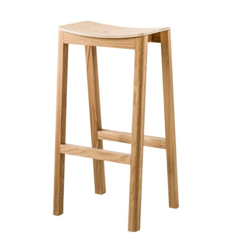 Halikko bar stool, tall by Made By Choice
Dimensions: 40 x 34 x 74 cm
Materials: solid oak
 Standard finishes: natural wood / painted black.

Also available: upholstery in fabric or Std. fabric (Category 1 & 2), custom color or ash 

Named