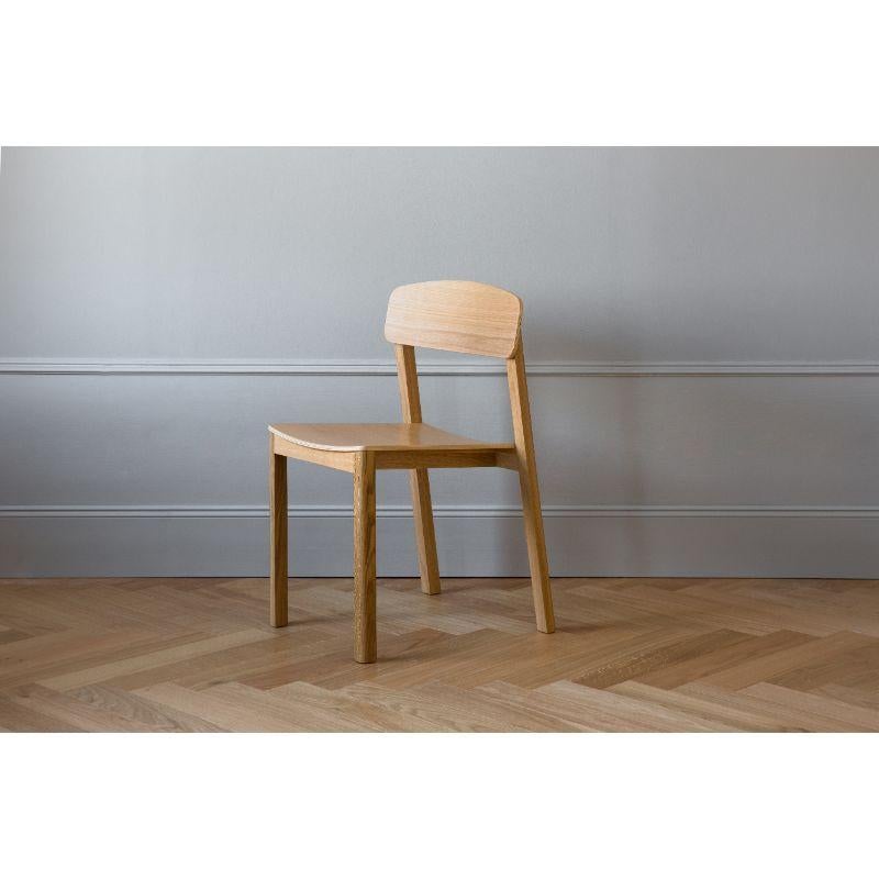 Halikko dining chair by Made By Choice
Dimensions: 51 x 47 x 79 cm
Materials: solid oak
 Standard finishes: natural wood / painted black.

Also available: upholstery in fabric or Std. fabric (Category 1 & 2), custom color or ash.

Named after