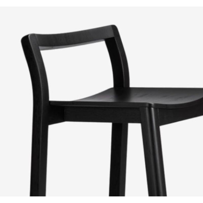 Halikko stool backrest, black by Made By Choice
Dimensions: 47 x 42 x 84 cm
Materials: solid oak
 Standard finishes: natural wood / painted black.

Also available: upholstery in fabric or Std. fabric (Category 1 & 2), custom color or