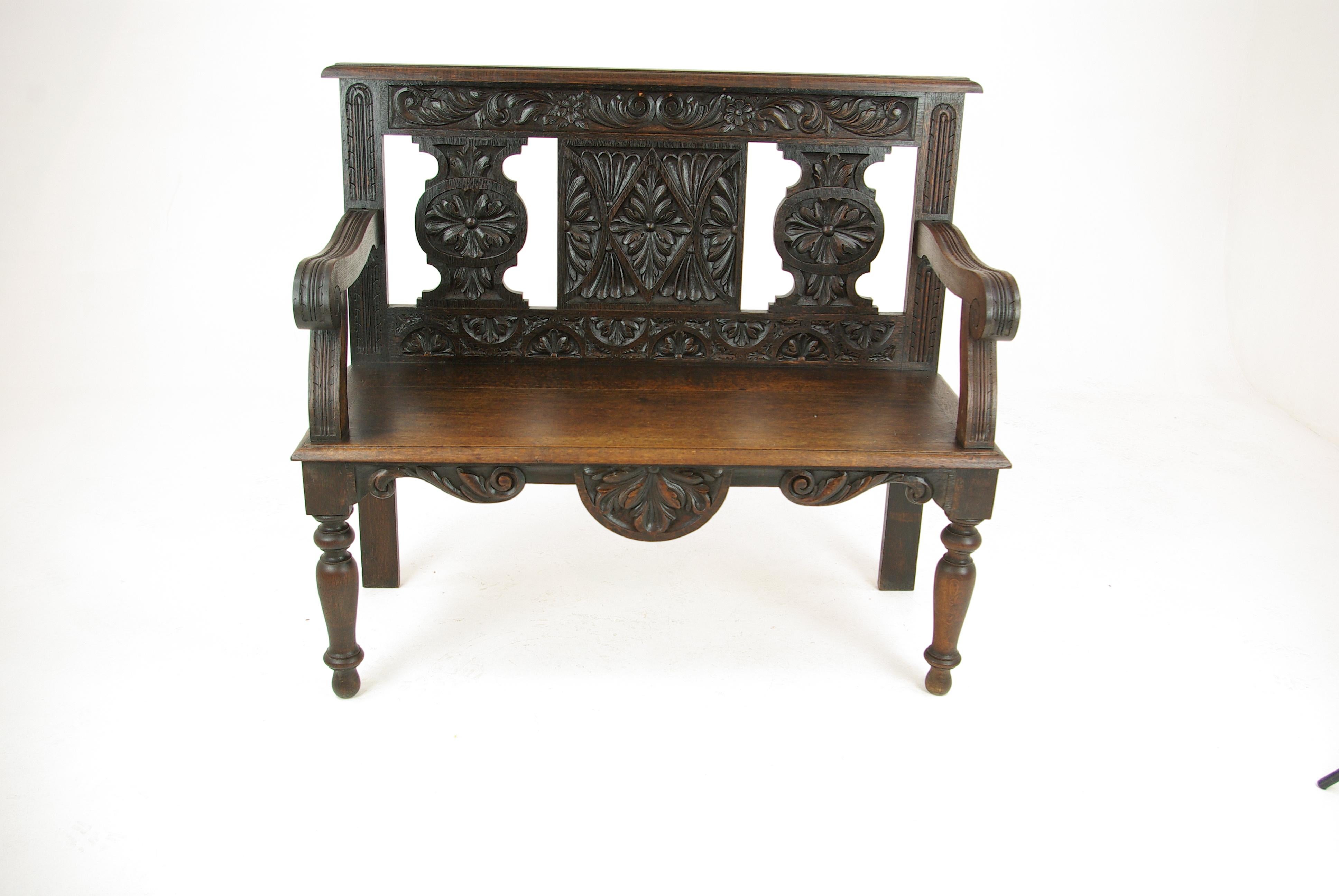 Hall bench, hall seat, carved oak bench, entryway furniture, Scotland, 1880, Antique Furniture, B1181.

Scotland, 1880.
Solid oak construction
Original finish
Heavily carved open back
Solid oak seat
Pair of thick rolled arms
Carved skirt