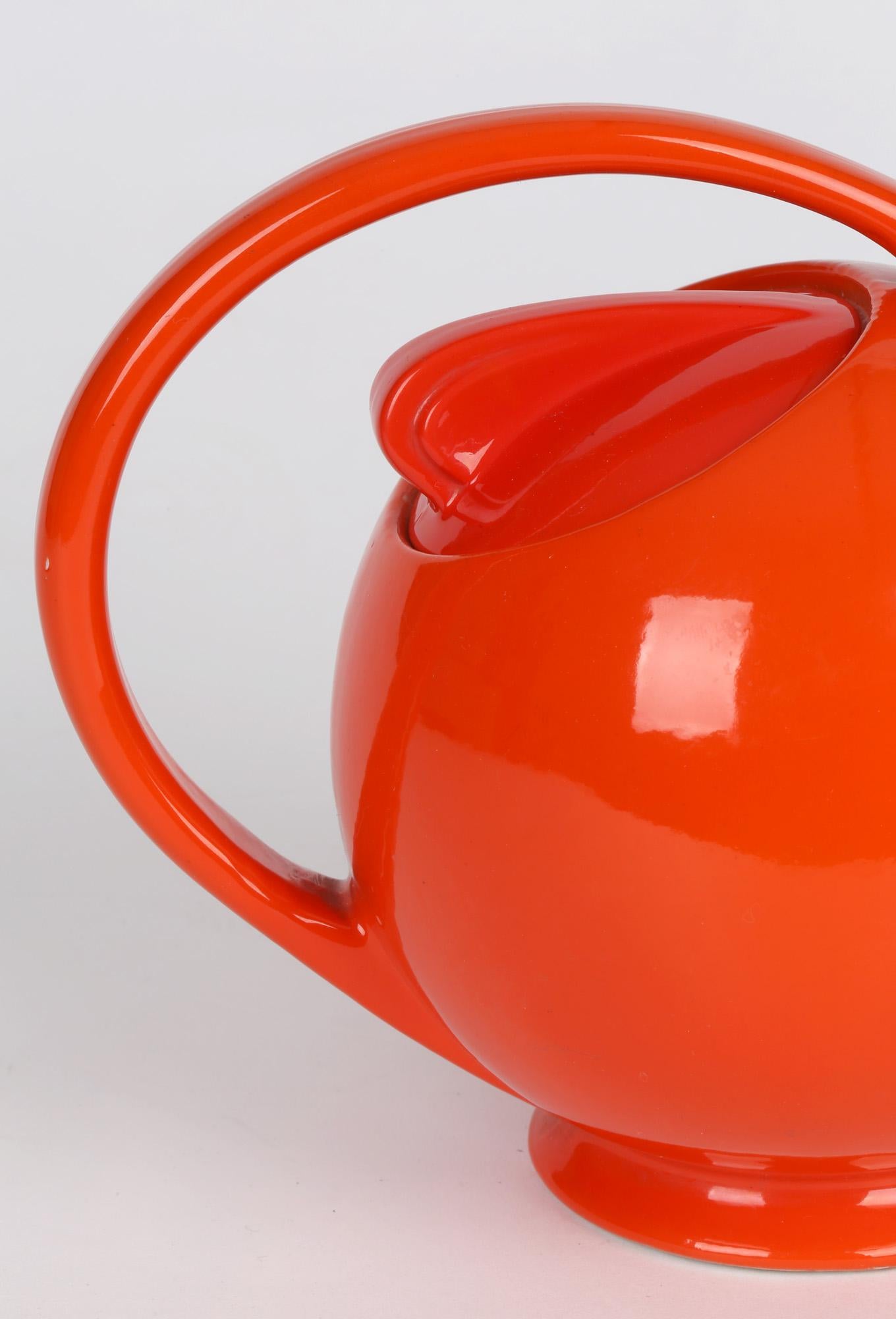 Hall China Company Art Deco Orange Glazed Airflow Shape Lidded Teapot 1