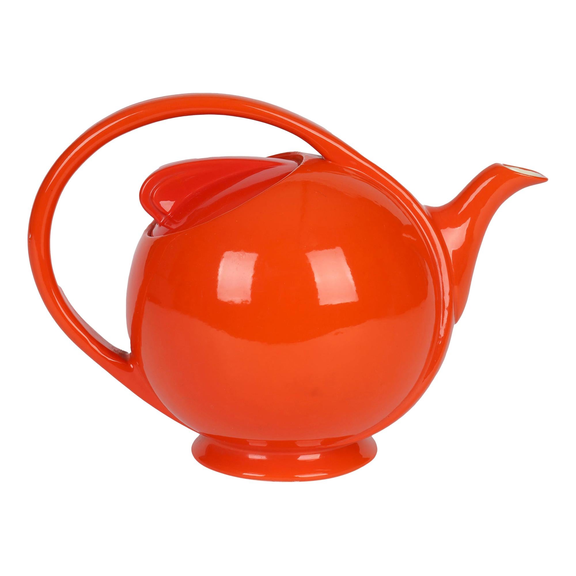 Hall China Company Art Deco Orange Glazed Airflow Shape Lidded Teapot