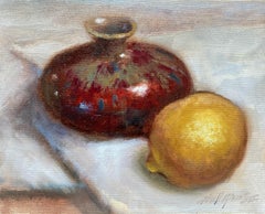Zitrone mit scharlachroter Vase