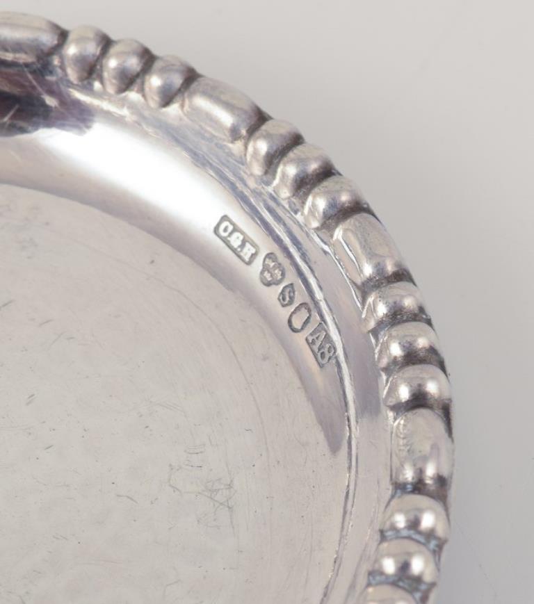 Hallberg, Proveedor de la Corte Real Sueca. Doce posavasos de cristal plateado. principios del siglo XX en venta
