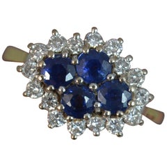 Hallmarked 18 Carat Gold Sapphire and Diamond Cluster Ring
