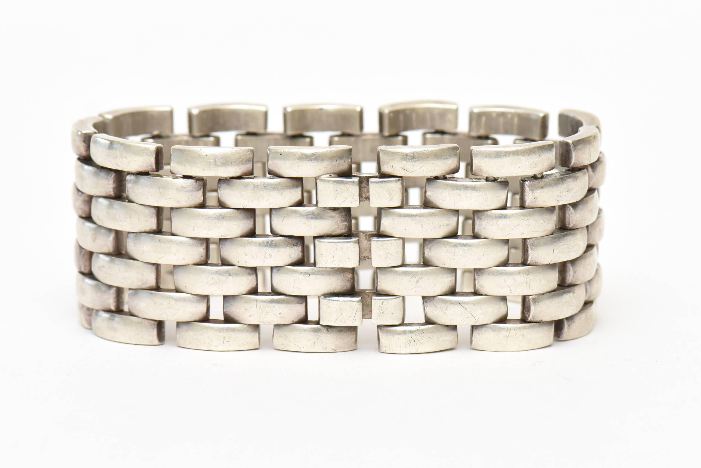 This stunning hallmarked sterling silver cuff bracelet is a classic. It will go day to evening for wear and all seasons. Timeless!  Modern! The measurements when the bracelet is opened are 7.25