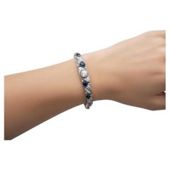Art-Déco-Armband aus Platin mit Punzierung und insgesamt 5,50 Karat Diamanten und Saphiren