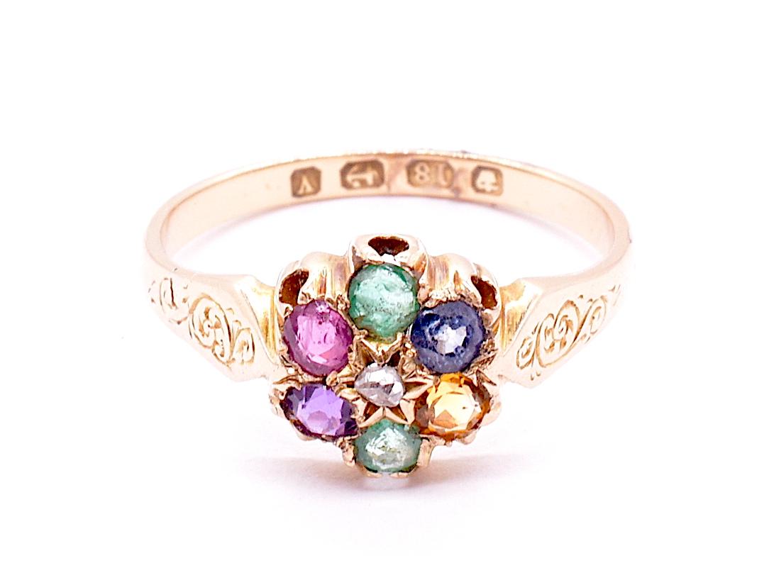 Acrostic jewelry, where the first letters of the gemstones spell a romantic word, were love tokens of the Georgian era. Our ring, hallmarked for Birmingham, 1873, reveal stones set in circular order and each of whose names spell out the word