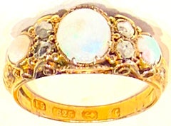 Hallmarked Birmingham 1877 15K opal and diamond 7 stone ring