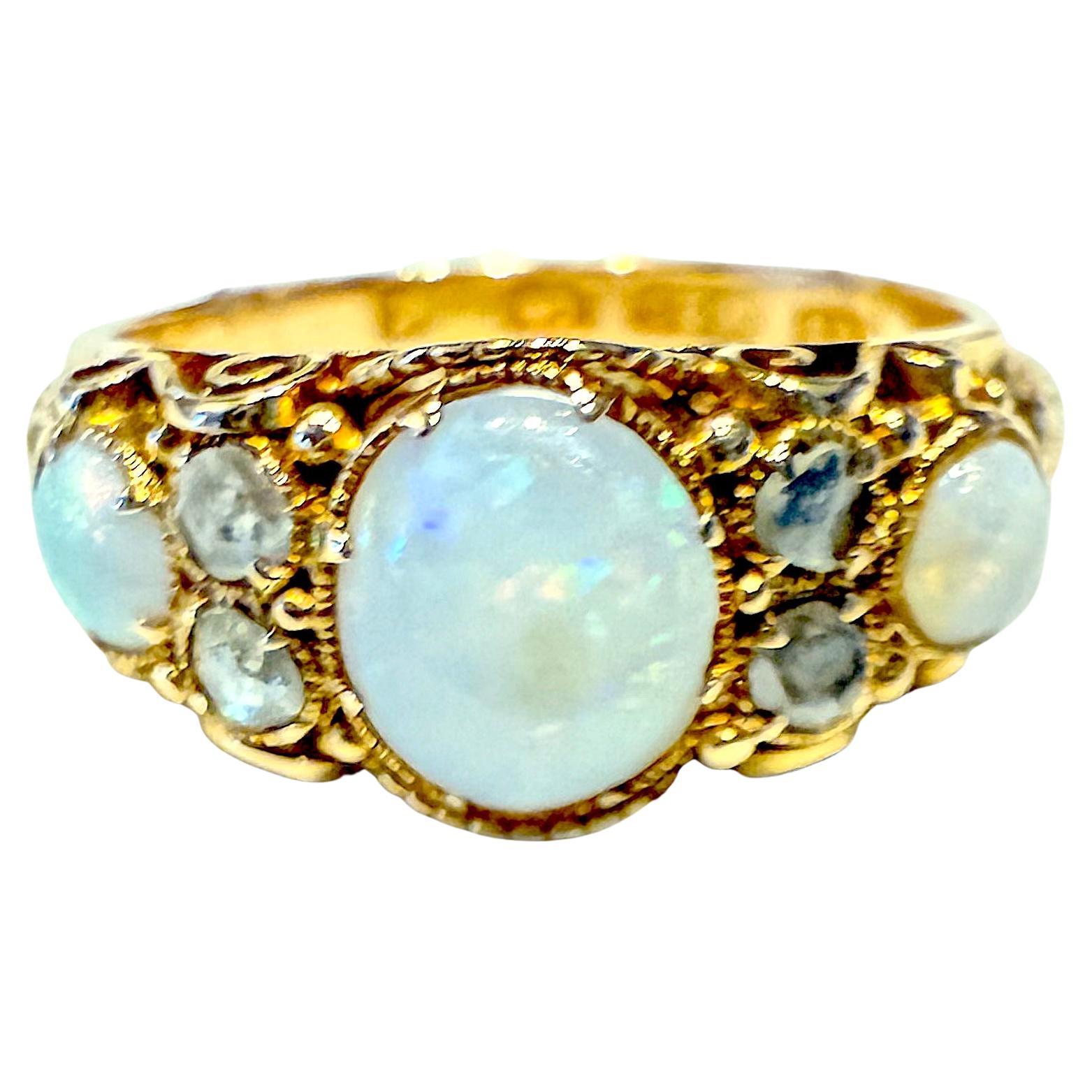 Hallmarked Birmingham 1877 15K opal and diamond 7 stone ring